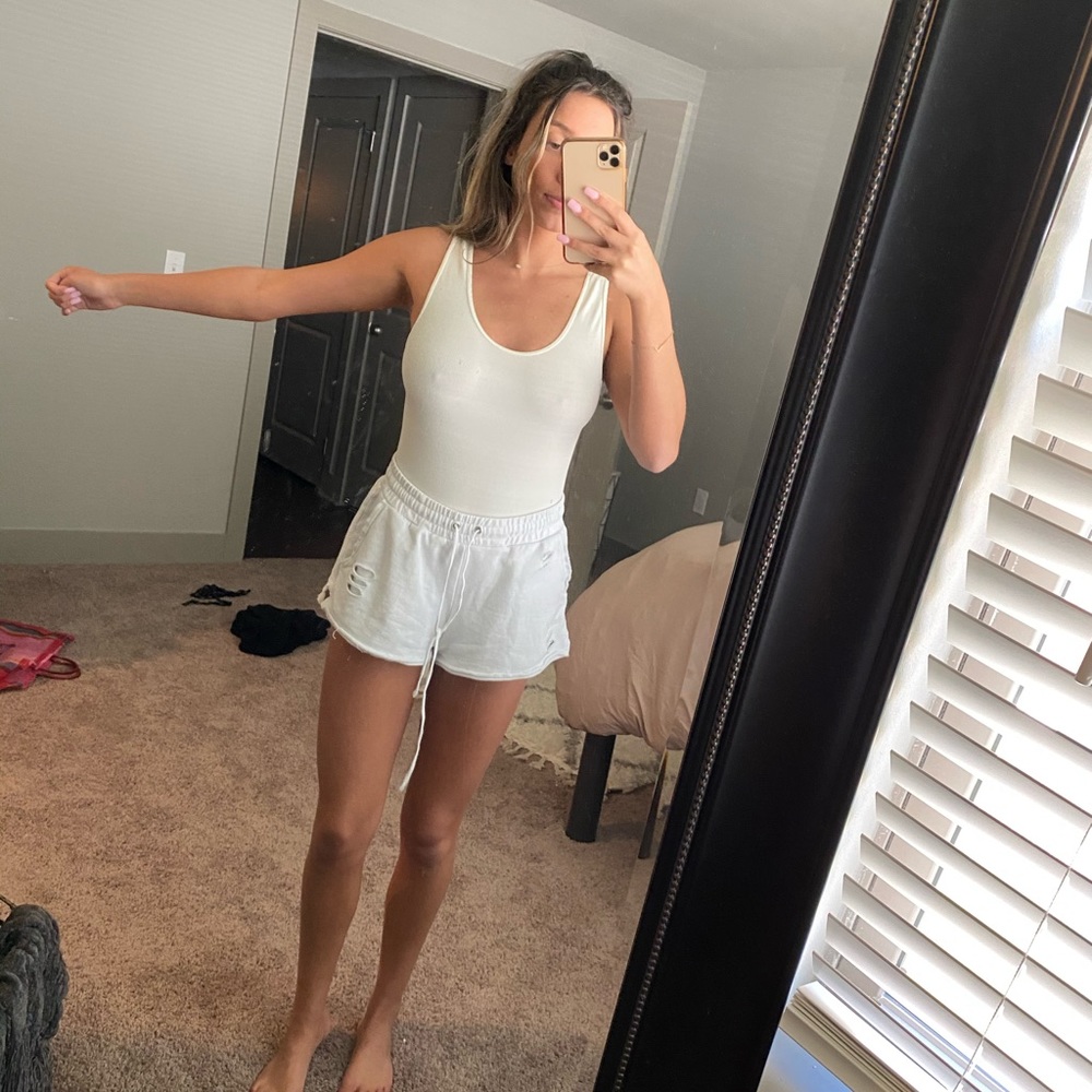 Cream colored body suit
